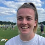 Lauren Hemp signs autographs at Norwich football centre