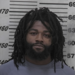 Smell of marijuana leads to arrest on drug and gun charges